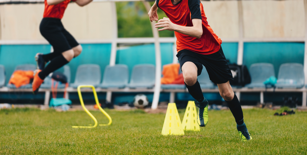 Boy,Soccer,Player,In,Training.,Boys,Running,Between,Cones,Amd Jurgen Klopp soccer methodology