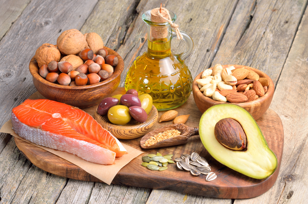 Selection,Of,Healthy,Fat,Sources,On,Wooden,Background. soccer science & performance