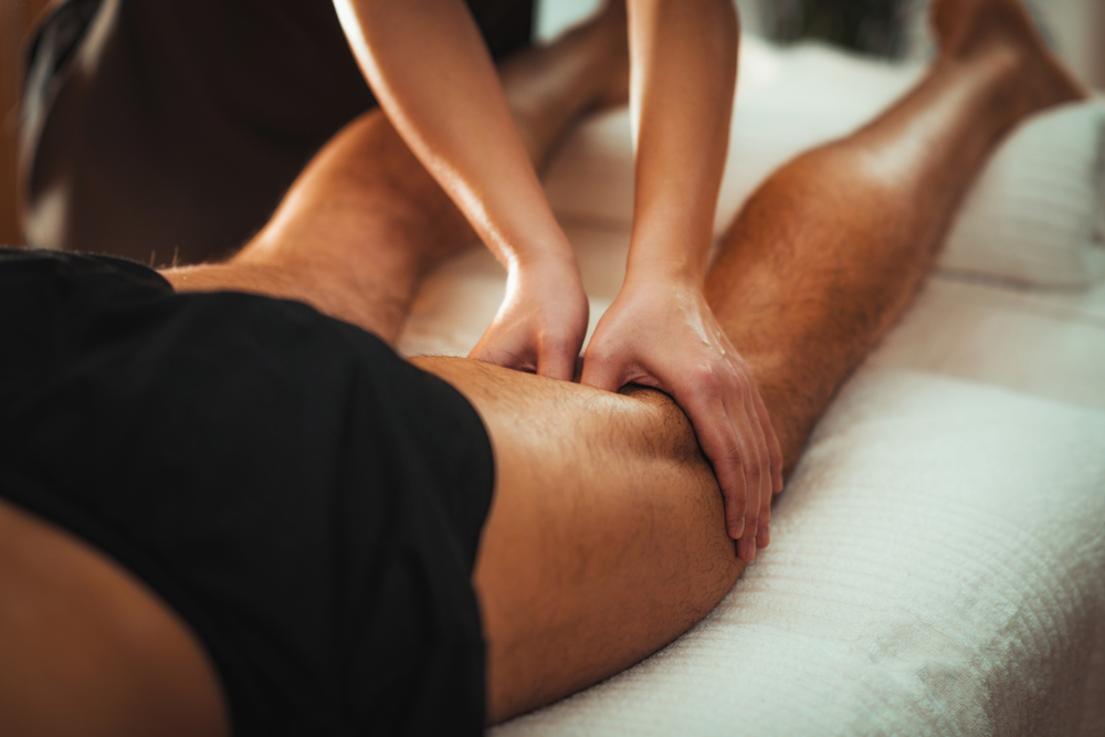 Physiotherapist,Massaging,Male,Patient,With,Injured,Leg,Muscle.,Sports,Injury soccer science & performance