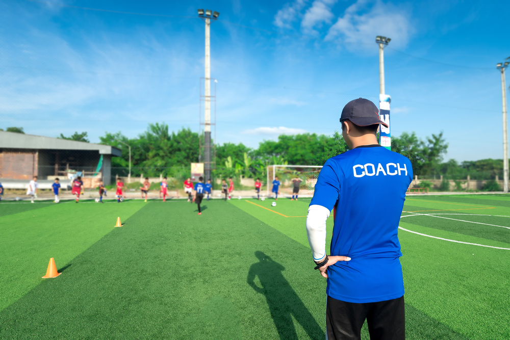 Blurred,Image,Of,Coach,Is,Coaching,Children,Training,In,Soccer nutrition for footballers